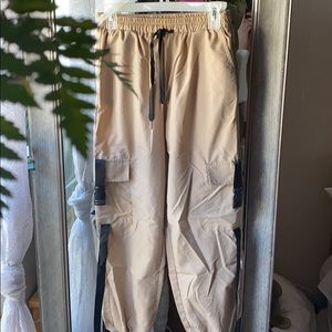 Windbreaker styled tan joggers